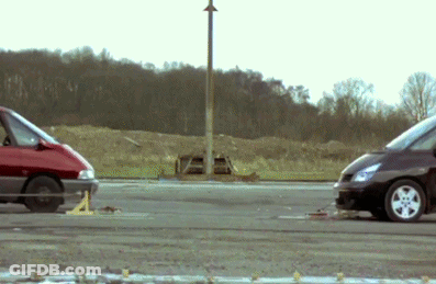 Two Cars Parked On Road GIF