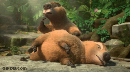 Two Cartoon Animals Laying On Their Backs GIF