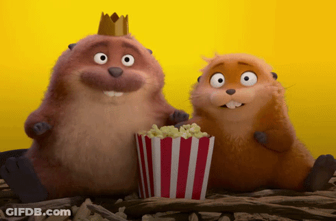 Two Cartoon Beavers Sitting Next To Each Other With A Bucket Of Popcorn GIF