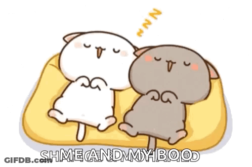 Two Cartoon Cats Are Sleeping On A Yellow Blanket . GIF