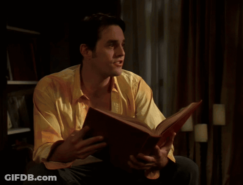 Two Cartoon Characters And Letter K GIF
