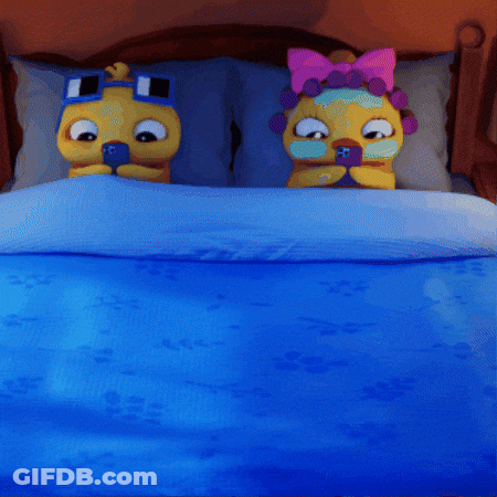 Two Cartoon Characters Are Laying On A Bed With A Blue Comforter GIF