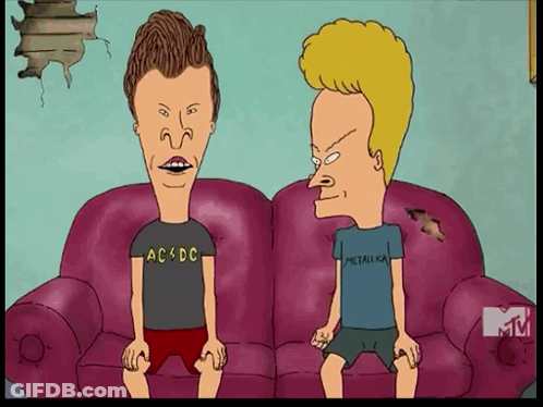 Two Cartoon Characters Are Sitting On A Couch One Is Wearing A Ac Dc Shirt And The Other Is Wearing A Metallica Shirt GIF