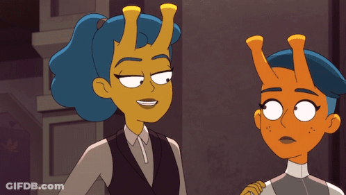 Two Cartoon Characters Are Standing Next To Each Other And One Has Blue Hair And The Other Has Orange Hair GIF