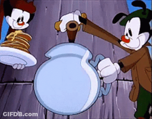Two Cartoon Characters Are Standing Next To Each Other One Is Holding A Plate Of Pancakes GIF