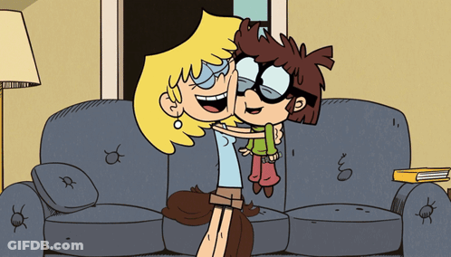 Two Cartoon Characters Hug On Couch GIF