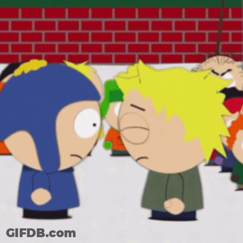 Two Cartoon Characters In Front Of Red Brick Wall GIF
