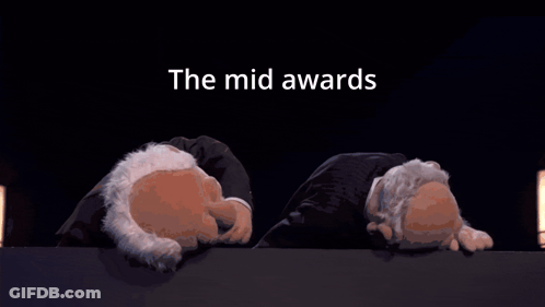 Two Cartoon Characters Laying Down Mid Awards GIF