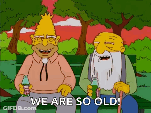 Two Cartoon Characters On Bench Holding Soda Saying We Are So Old GIF