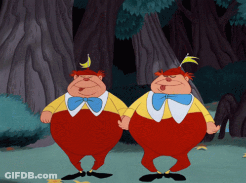 Two Cartoon Characters One With Banana On Head GIF
