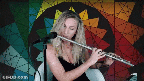Two Cartoon Characters Playing Flutes Under Cherry Blossoms GIF