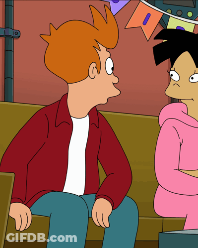 Two Cartoon Characters Sitting On Couch, One With Letter I On Shirt GIF