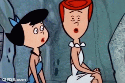 Two Cartoon Characters Sitting One Surprised GIF