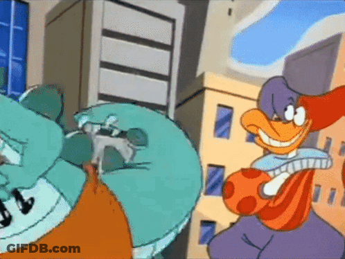Two Cartoon Characters Standing In City GIF