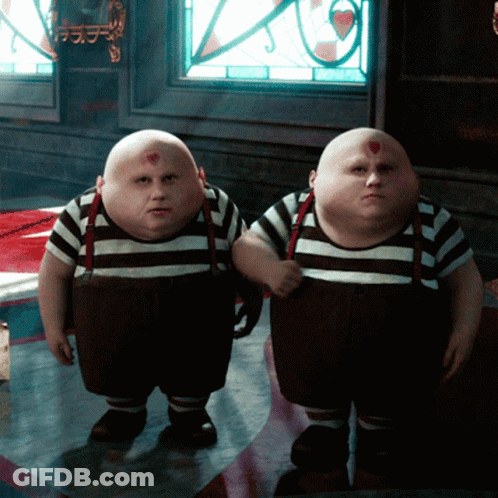 Two Cartoon Characters Standing GIF