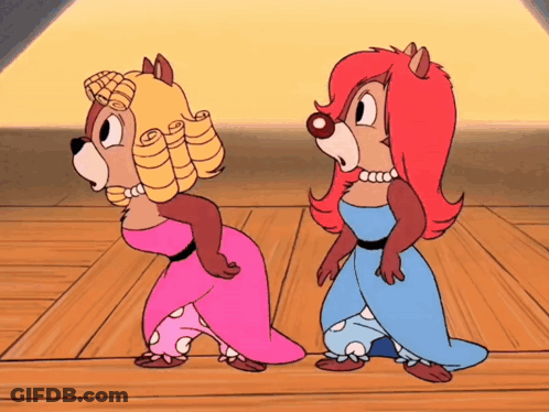 Two Cartoon Characters Standing Together GIF