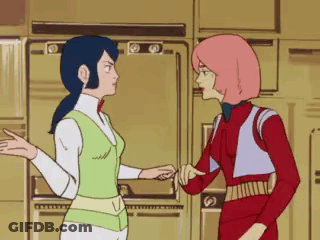 Two Cartoon Characters Standing Together GIF