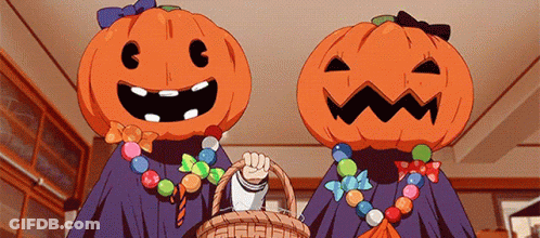 Two Cartoon Characters With Pumpkins On Their Heads And A Basket Of Candy . GIF