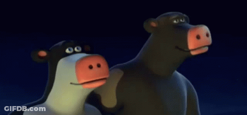 Two Cartoon Cows With Red Noses In The Dark GIF