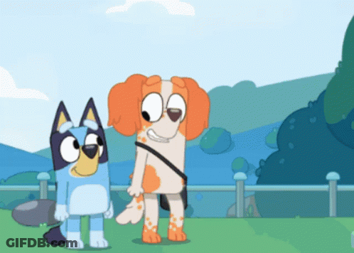 Two Cartoon Dogs Standing On Grassy Field GIF