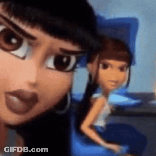 Two Cartoon Dolls Sitting On A Chair GIF