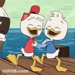 Two Cartoon Ducks Hugging On A Dock GIF