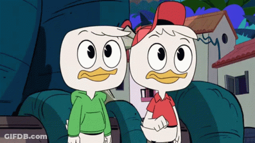 Two Cartoon Ducks Standing In Front Of House GIF