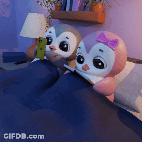 Two Cartoon Penguins In Bed On Phone GIF