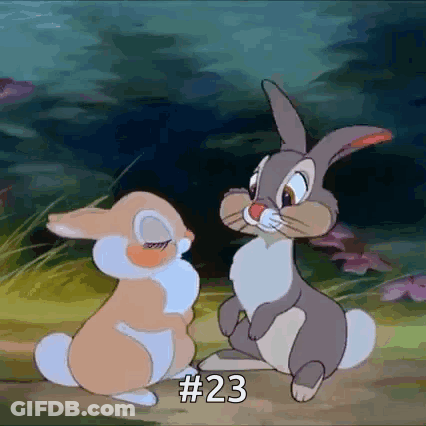 Two Cartoon Rabbits Are Standing Next To Each Other In A Field With The Number 23 On The Bottom . GIF