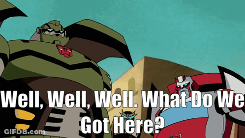 Two Cartoon Robots Are Standing Next To Each Other With The Words Well Well Well What Do We Got Here GIF
