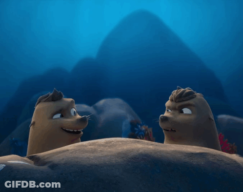 Two Cartoon Seals Are Looking At Each Other In The Water GIF