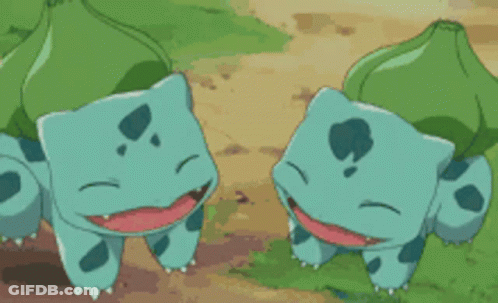 Two Cartoon Turtles Standing Together GIF