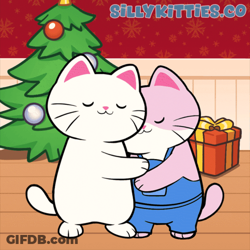 Two Cats Hugging In Front Of Christmas Tree GIF