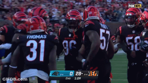 Two Cheerleaders Sitting At Table Saying No GIF