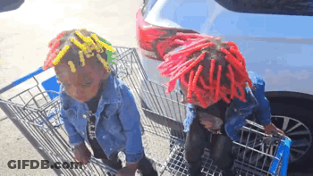 Two Children In Red Dreadlocks Pushing Shopping Cart GIF