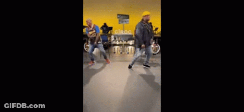 Two Children With Red Dreadlocks Pushing Shopping Cart GIF