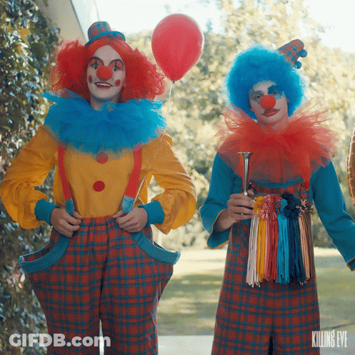 Two Clowns Are Standing Next To Each Other With Killing Eye Written On The Bottom Right GIF