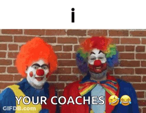 Two Clowns Standing In Front Of Brick Wall GIF