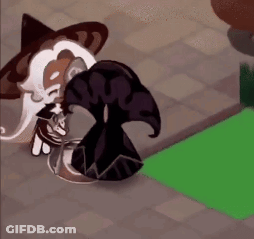 Two Cookies Sitting Next To Each Other On Sidewalk GIF
