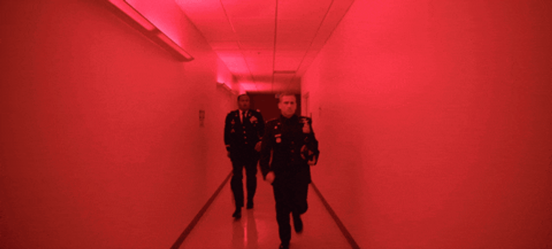 Two Cops Speed Walking GIF