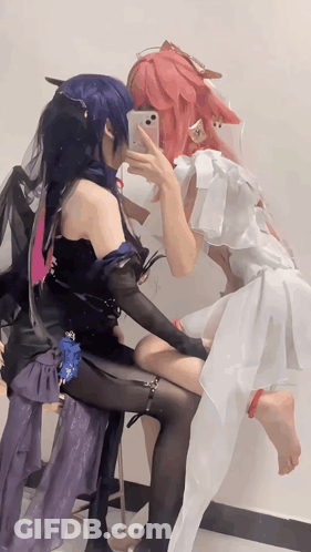 Two Cosplay Women Taking Selfie GIF