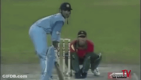 Two Cricket Players Playing On Field With Sports TV Logo GIF