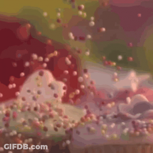Two Cupcakes With Pink Frosting GIF