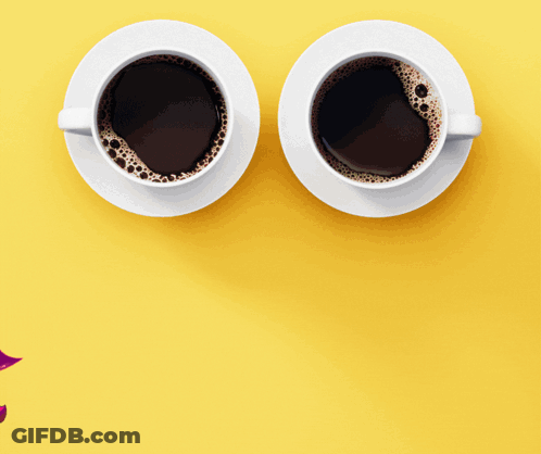 Two Cups Of Coffee On Yellow Background With Devil Wearing Sunglasses GIF