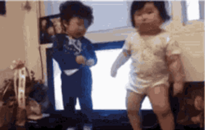 Two Cute Babies Funny Dancing GIF