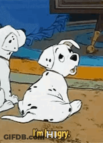 Two Dalmatian Puppies Sitting Together GIF