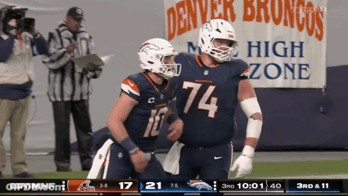 Two Denver Broncos Football Players On Field GIF