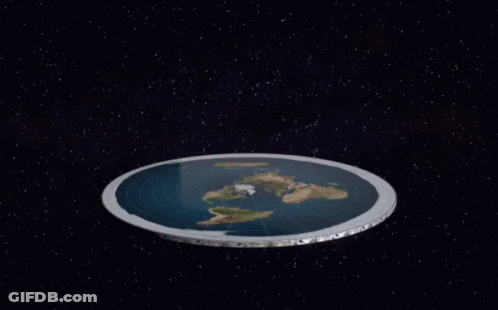 Dinosaurs Walking In Grass With Mountains GIF