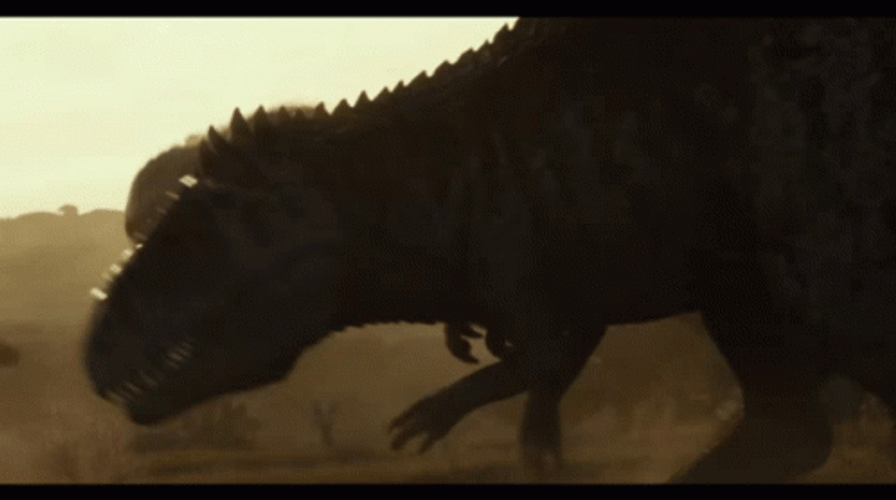 Two Dinosaurs Fighting In Jurassic World GIF
