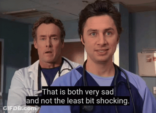 Two Doctors Are Standing Next To Each Other And One Of Them Is Saying That Is Both Very Sad And Not The Least Bit Shocki GIF